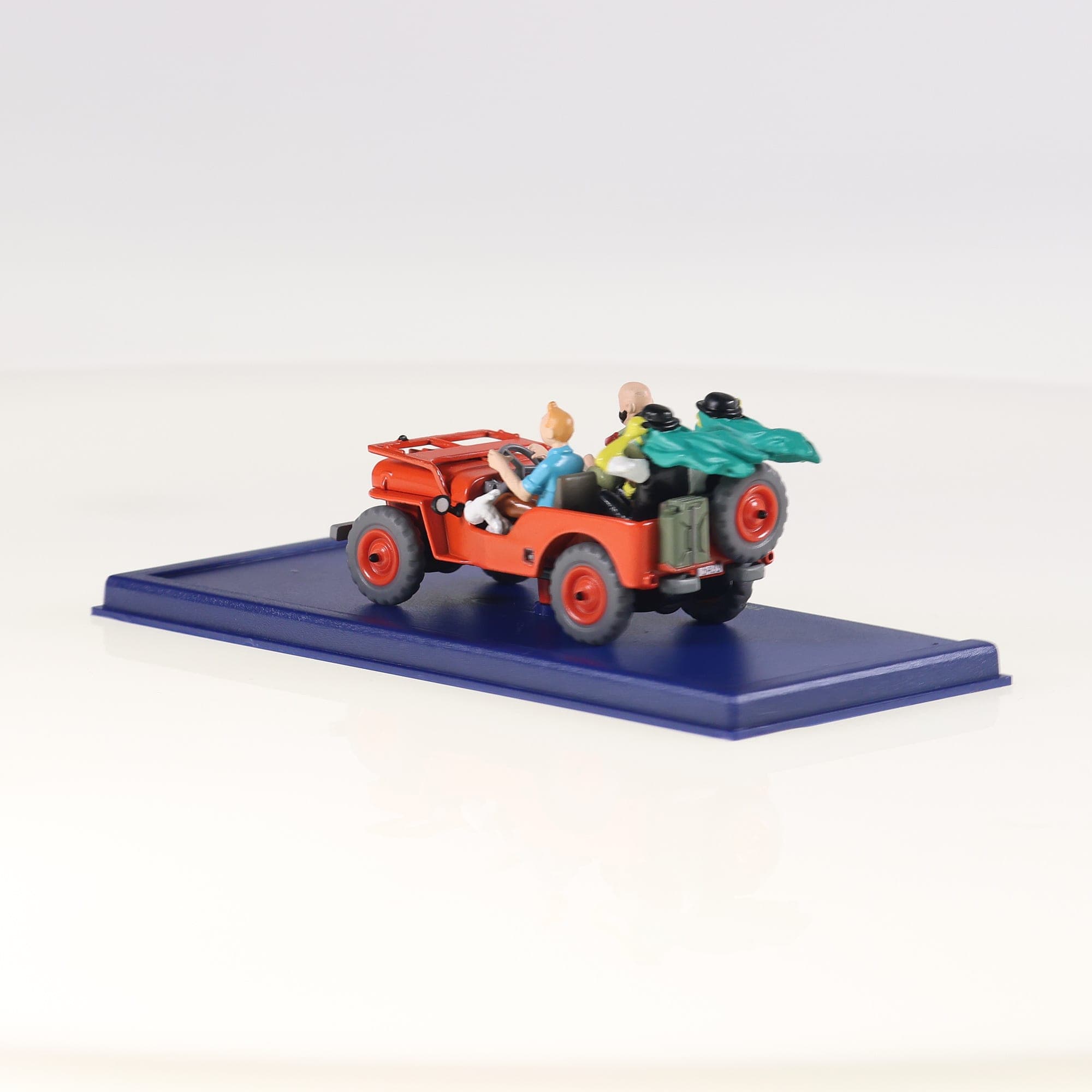 Jeep rouge de la couverture - Tintin Au pays de l'Or Noir 1/43 Atlas — miniature 8