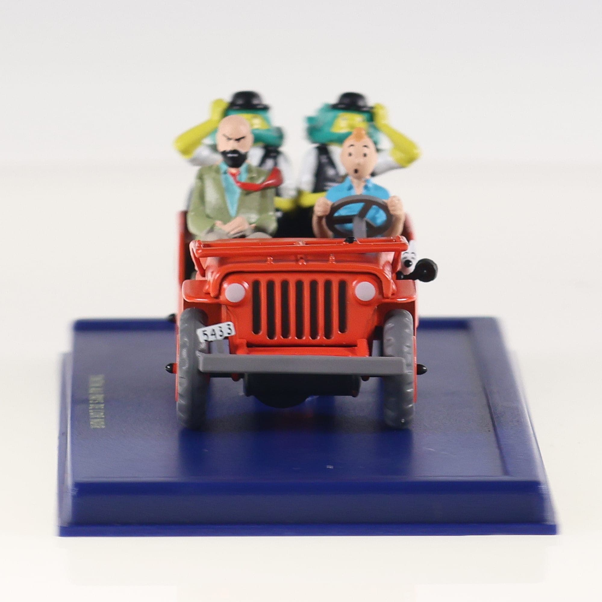 Jeep rouge de la couverture - Tintin Au pays de l'Or Noir 1/43 Atlas — miniature 13