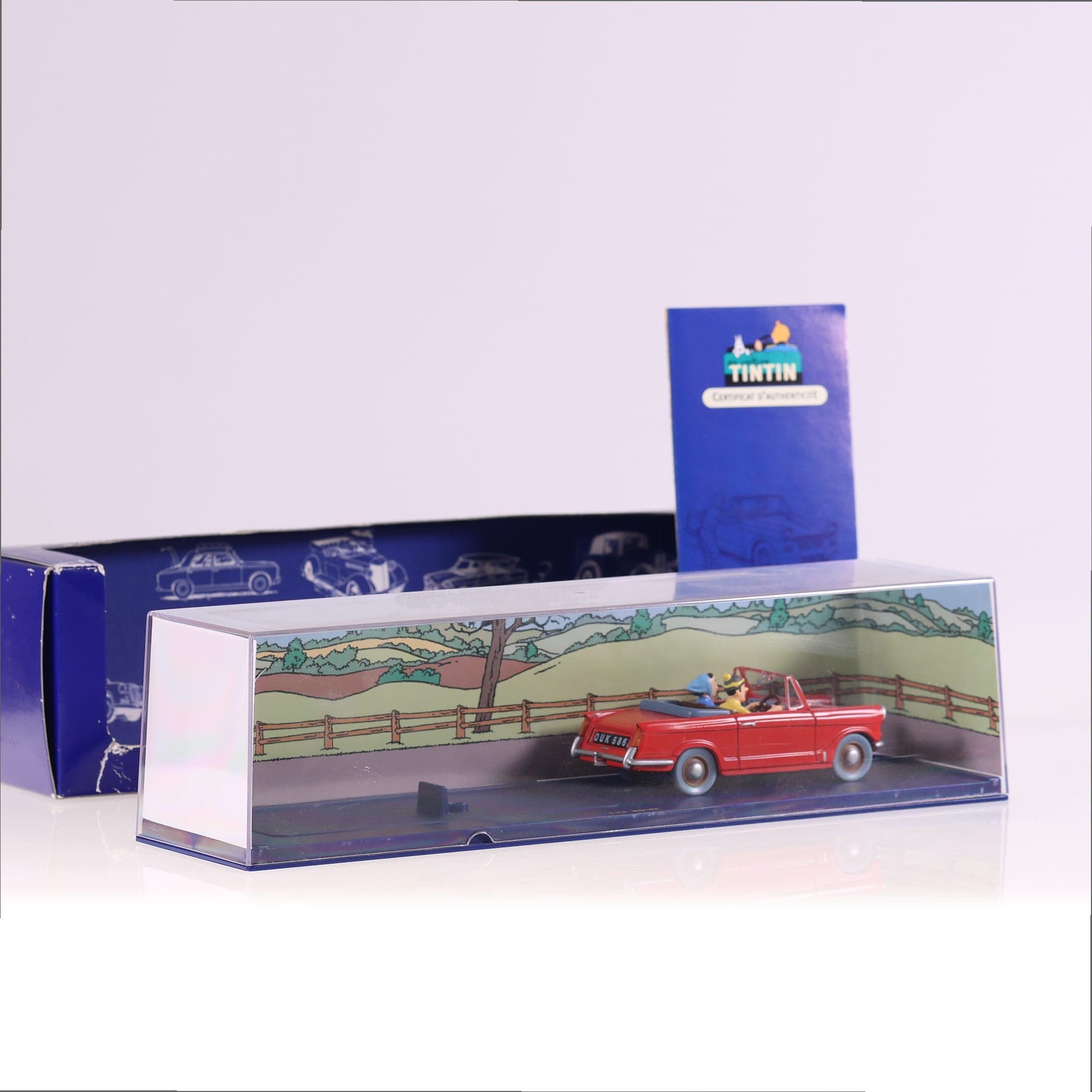 Atlas Triumph Herald de Lîle noire - Tintin 1/43 Rouge avec boîte