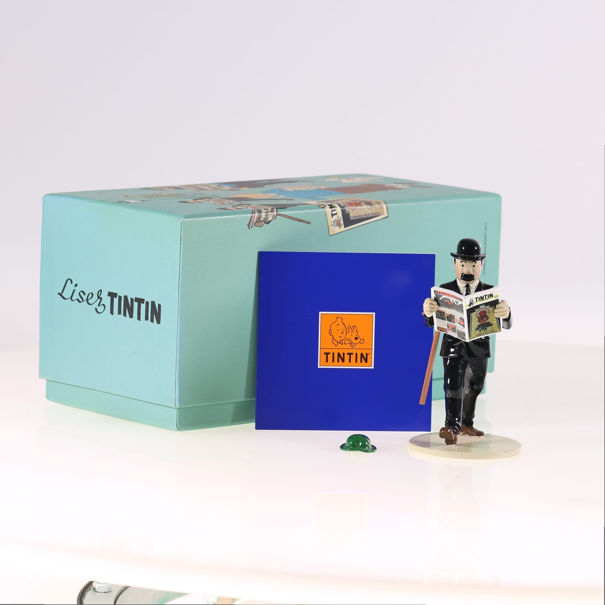 Pixi Tintin Lisez Tintin Dupond lisant le journal Noir avec boîte