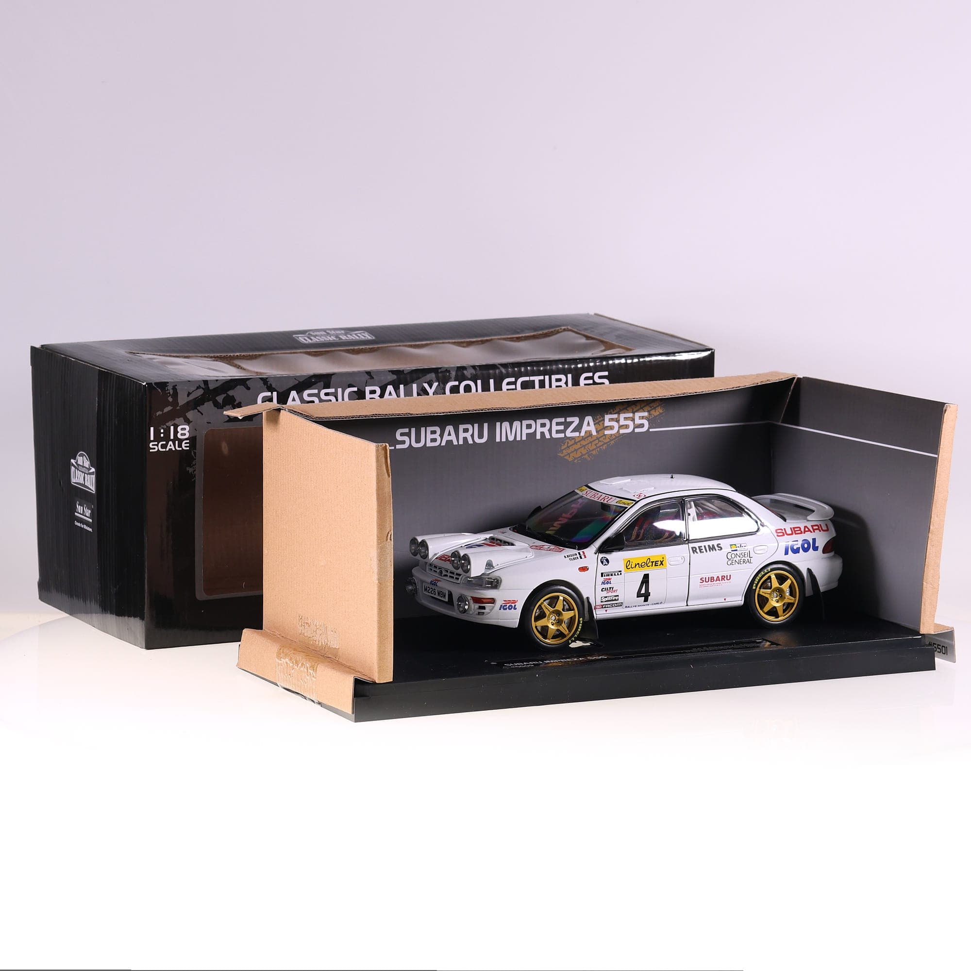 Sun star Subaru Impreza 555 #4 Rallye Monte Carlo 1996 1/18 Blanc avec boîte