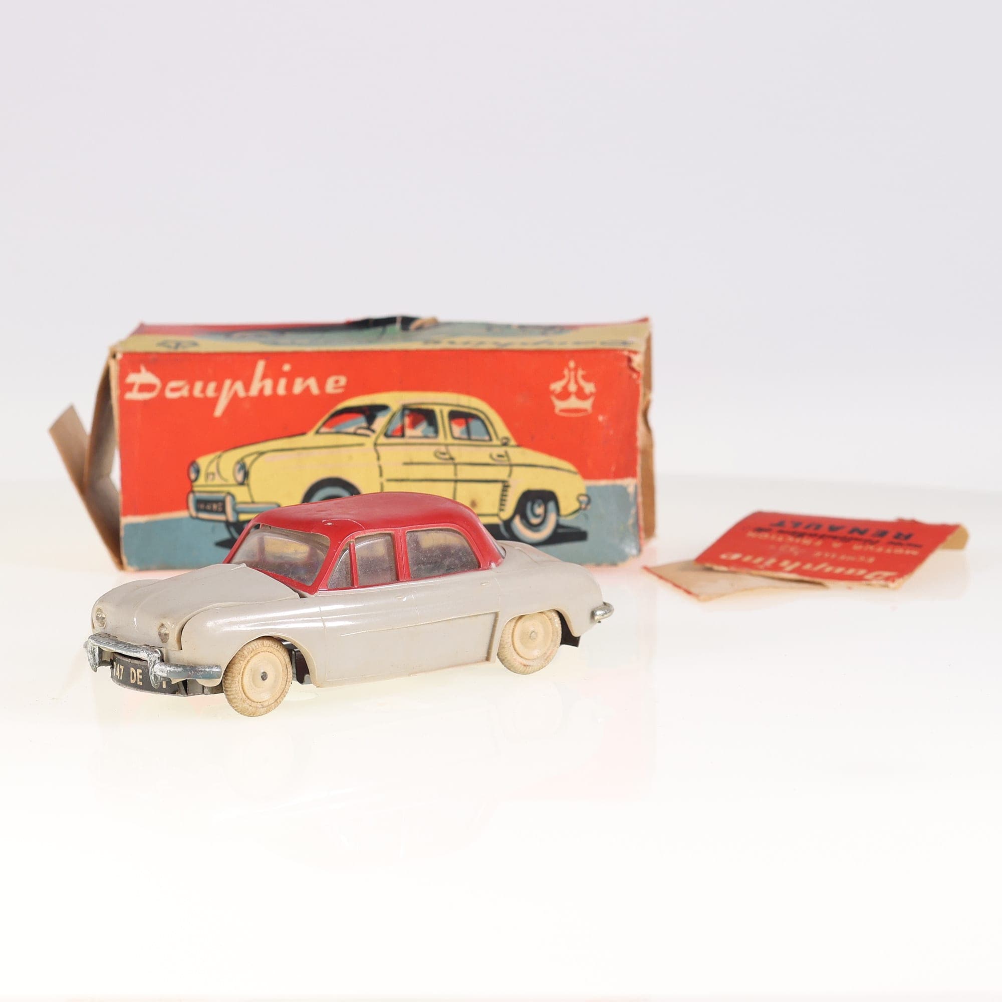 Renault Minialux Renault Dauphine 1/32 Bicolore crème et rouge Grade C avec boît — photo 1