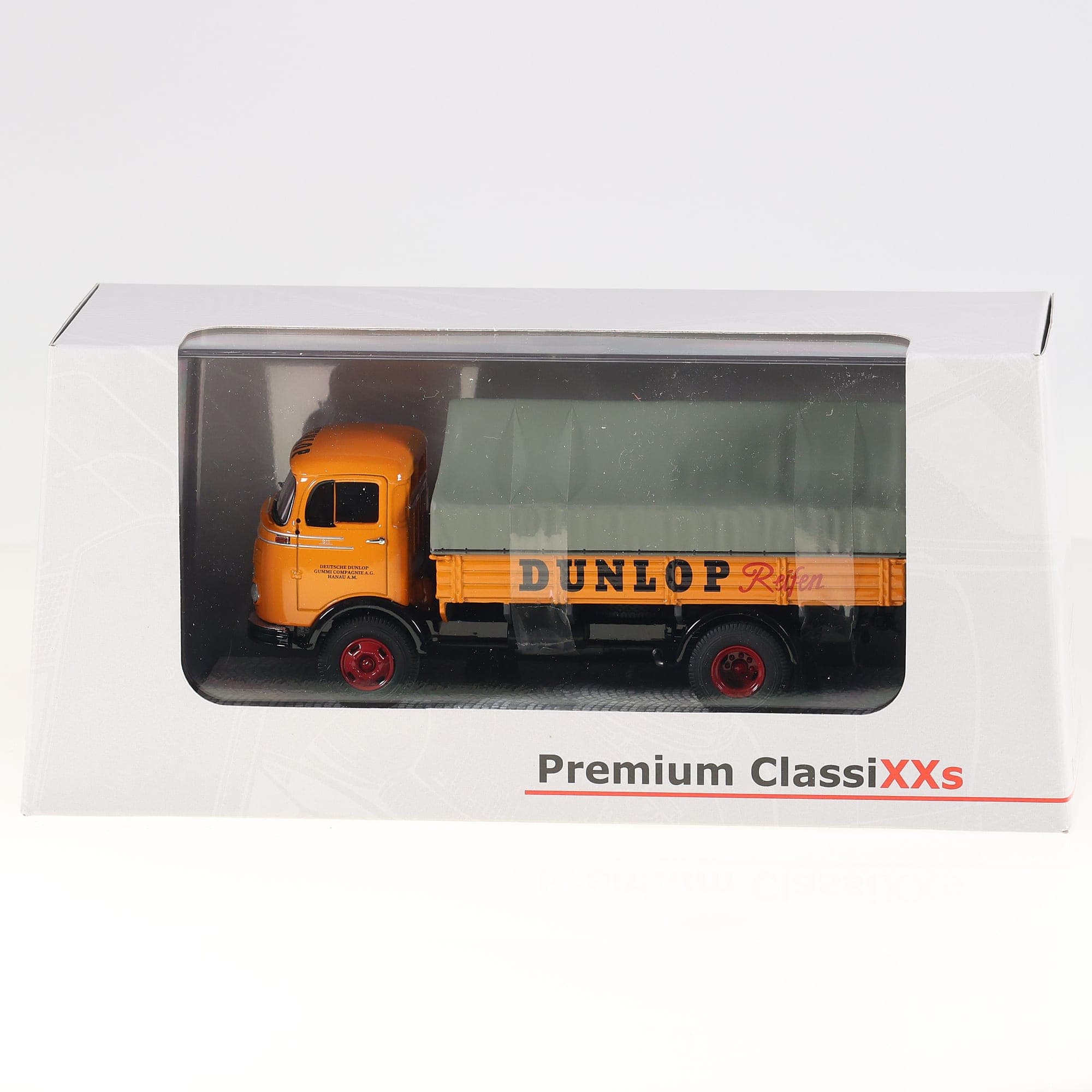 Premium ClassiXXs 12153 Mercedes-Benz LP 911 Camion bâché Dunlop 1/43 orange et