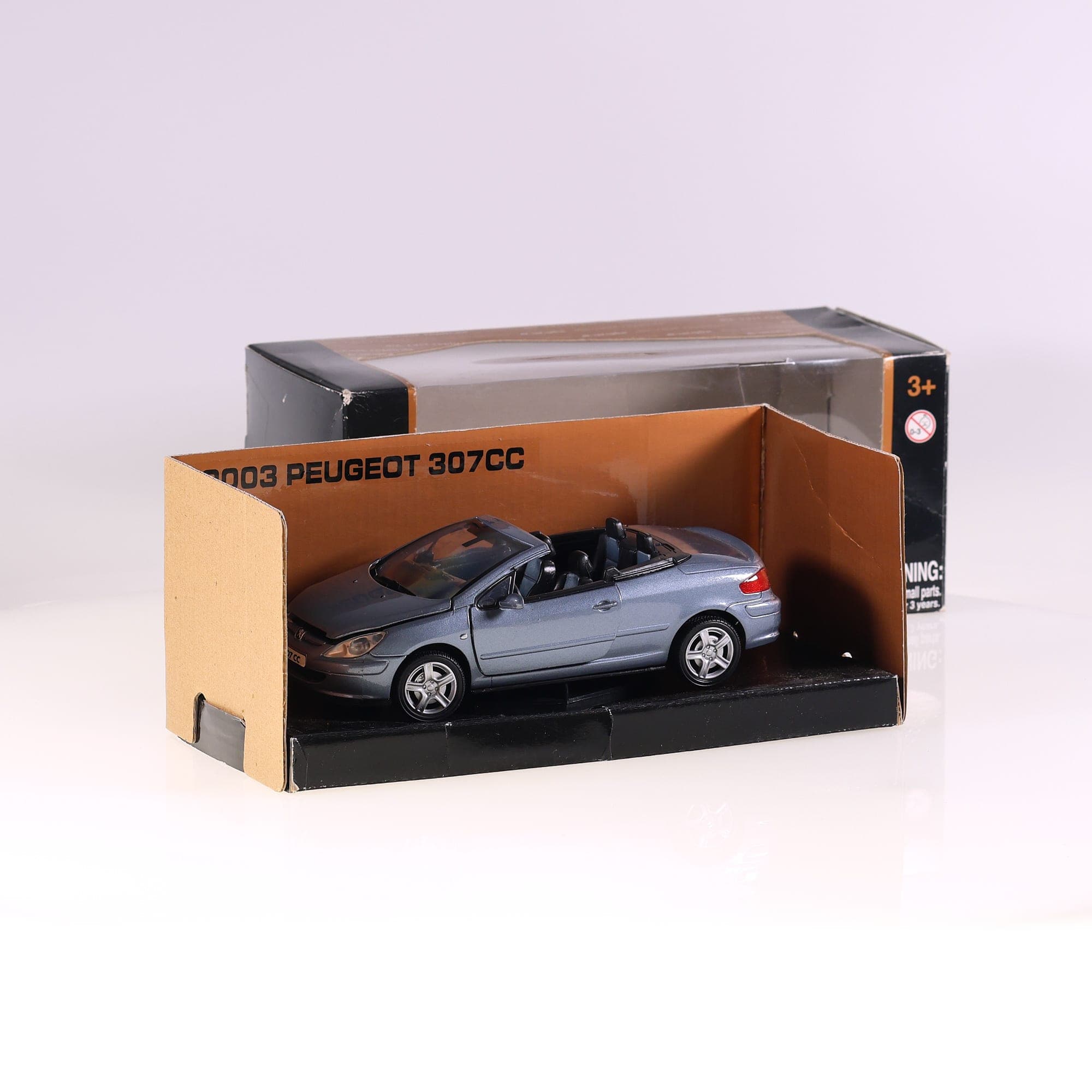 Motormax 73200 Peugeot 307CC 2003 1/24 Gris avec boîte — photo 1