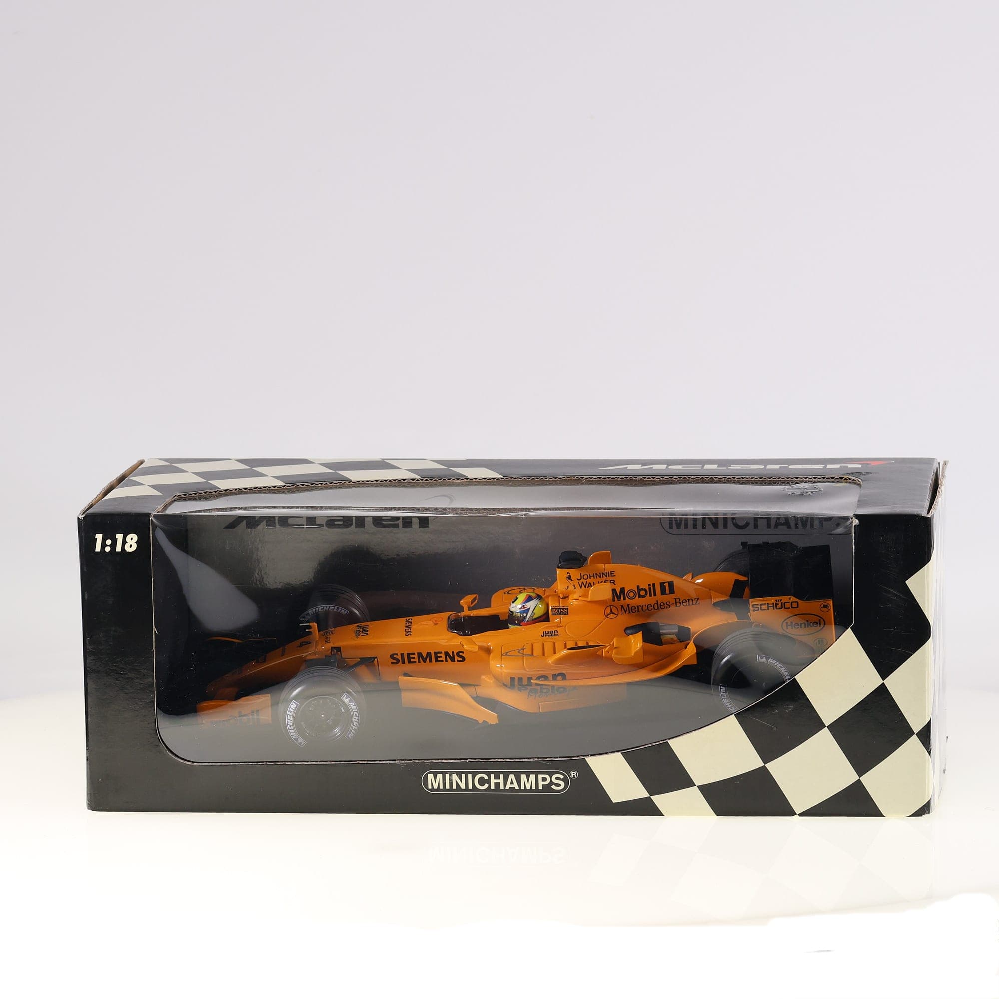 Minichamps McLaren Mercedes MP4-21 J.P. Montoya Interim Livery 2006 #4 1/18 — photo 1