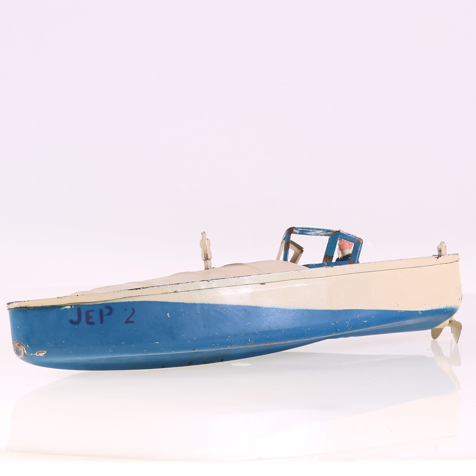 JEP bateau mécanique Bateau Bicolore 32 cm fonctionnel avec sa clé