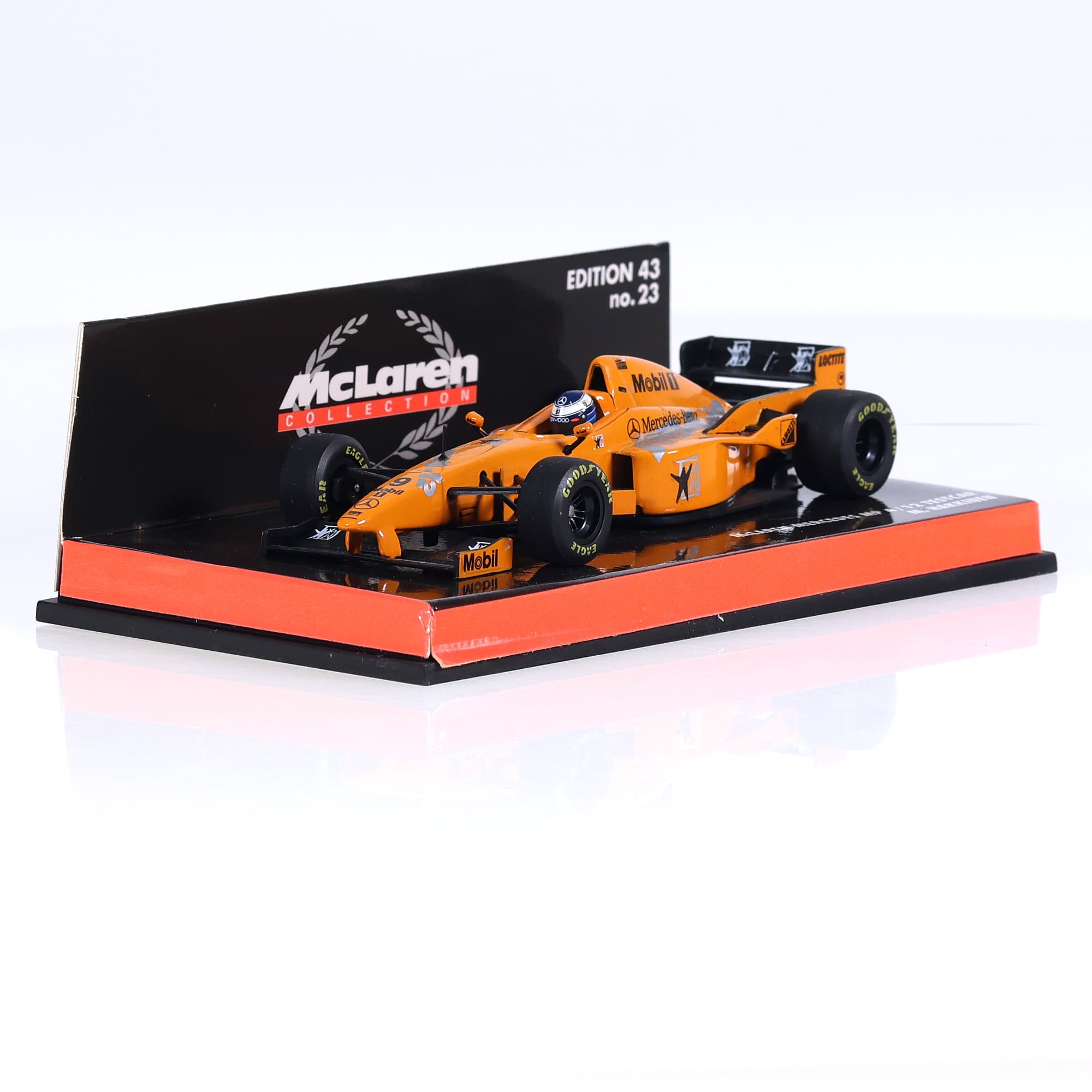 Minichamps 530 974389 MP4/12 test Car  #9 1/43 Orange avec boîte