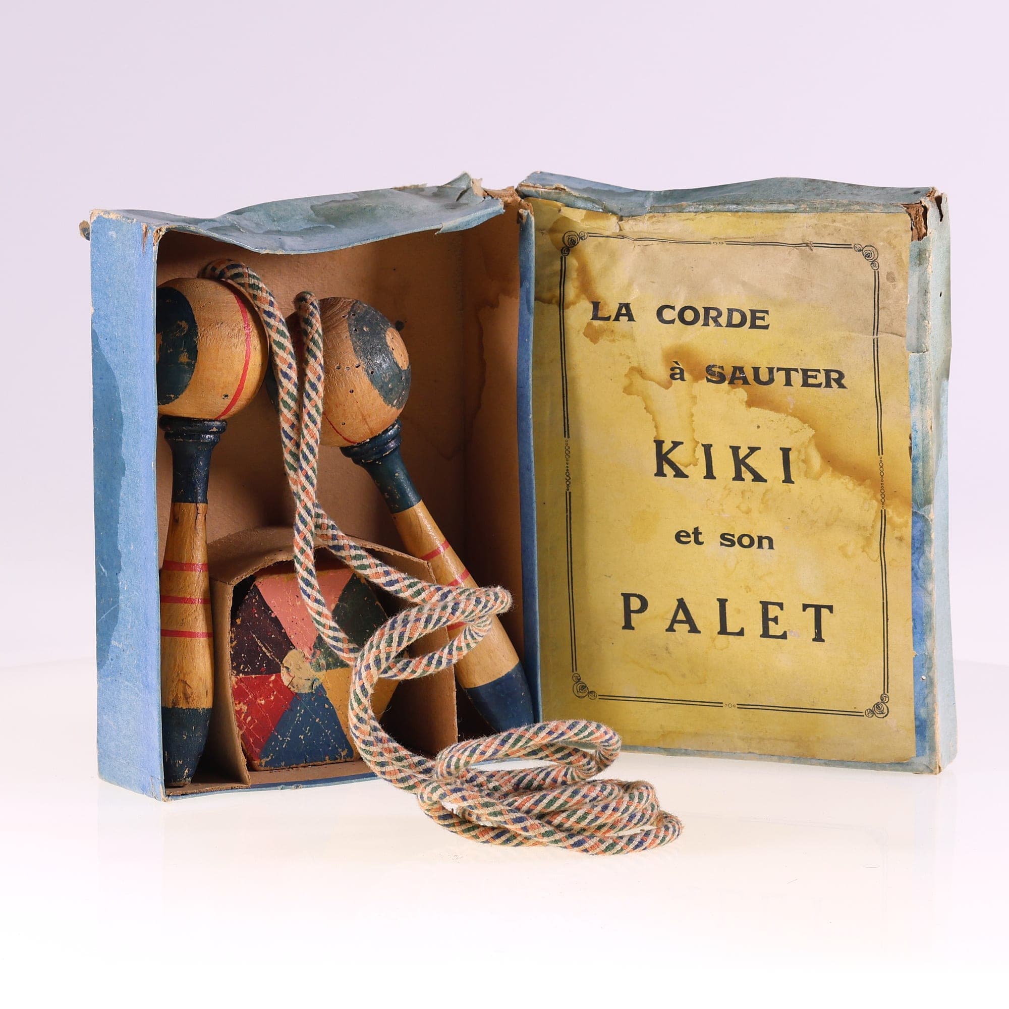 La corde à sauter KIKI et son palet en bois Grade C avec boîte